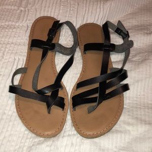 Black faux leather sandals